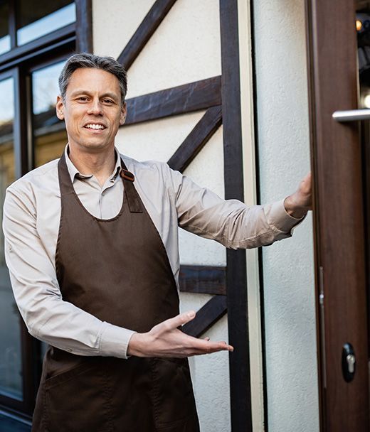 happy business owner - commercial insurance